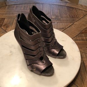 Heels bronze color. 4 inch heels